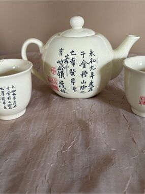 White Ceramic Chinese Script Teapot Set